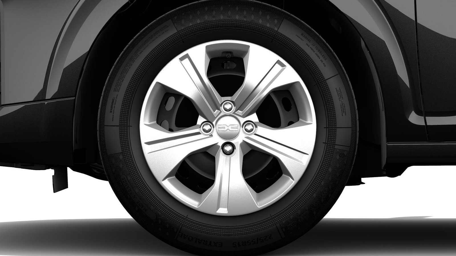 Close-up of an alloy wheel on a black Dacia Logan rental car
