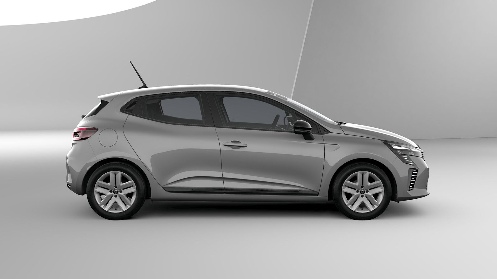 Gray Renault Clio 5 rental hatchback, side profile view